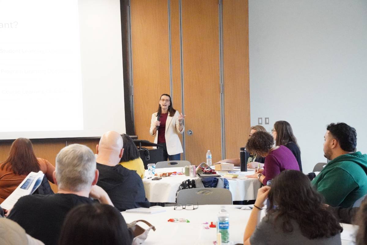 Amy Snively-Martinez presenting to a room of faculty and staff