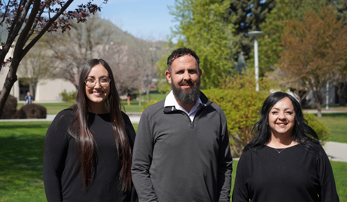 Three WVC counselors stand outside and smile at the camera.