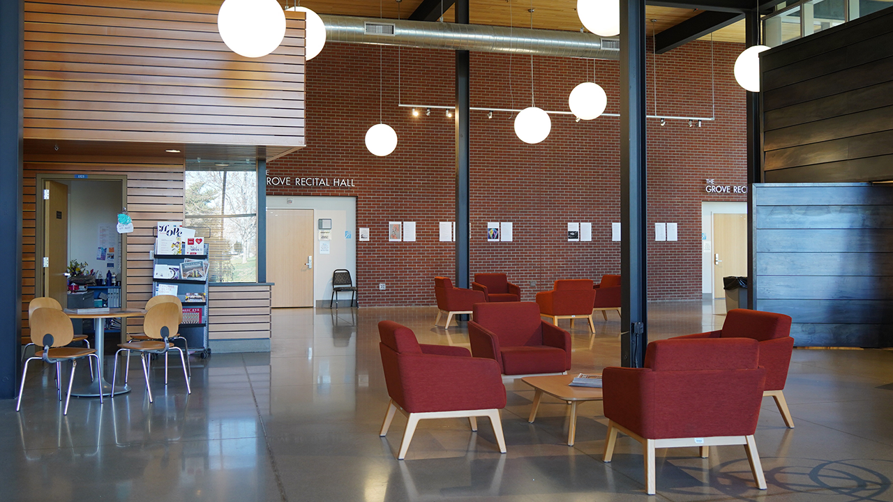 A view inside the Music and Art Center of the MAC Gallery entrance, The Grove Recital Hall entrance, and the ticket office.