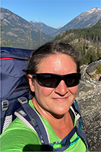 Portrait of Christina Eickmeyer hiking in the mountains